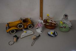 Mixed Lot: Model car, figural trinket boxes, a Royal Winton cabinet advertising plaque