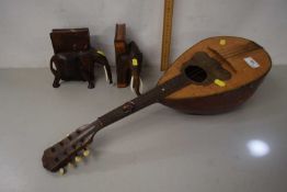 Vintage mandolin together with a pair of bookends formed as elephants with simulated ivory tusks