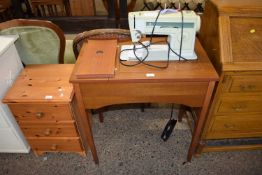 Singer sewing machine on stand