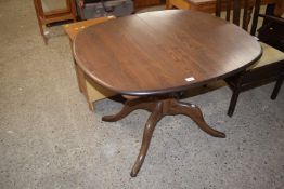 An Ercol pedestal dining table