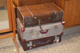 Group of three vintage suitcases