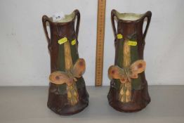 Pair of early 20th Century vases with butterfly decoration