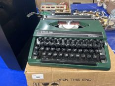 A Silver Reed portable typewriter