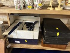 Child's microscope together with four empty cases or microscope slides