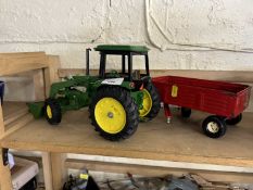 Model John Deere tractor with trailer