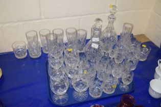 A large group of modern clear glass wares to include decanters, wine glasses, tumblers, liqueur