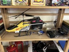 Radio controlled helicopter and another smaller