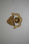A First World War brass cap badge of the 25th (Frontiersmen) Battalion. The Royal Fusiliers