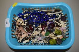 Small basket of assorted costume jewellery