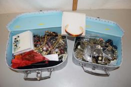 Two cases of assorted costume jewellery