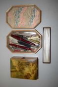 Two decorated boxes various assorted pens etc
