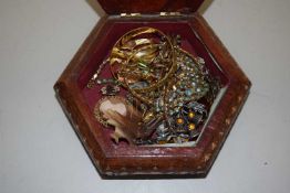 Wooden jewellery box containing assorted costume jewellery, brooches etc