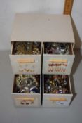 Small four drawer cabinet containing cosue jewellery