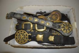 Box of various horse brasses