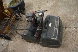 An Atco cylindrical mower