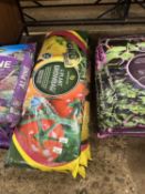 Five bags of Grow More Four Plant Grow Bags