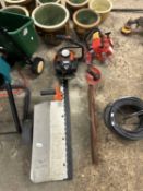 Two petrol hedgecutters