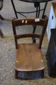 A Victorian elm seated child's chair