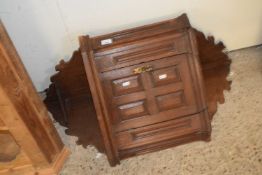 A late 19th Century oak wall mounted corner cabinet