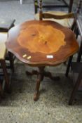 A reproduction inlaid wine table