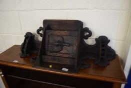 A late 19th Century wall mounted corner cabinet with carved bird decoration