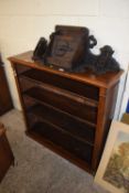 A Victorian mahogany open front bookcase cabinet