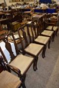 A set of five Queen Anne revival dining chairs