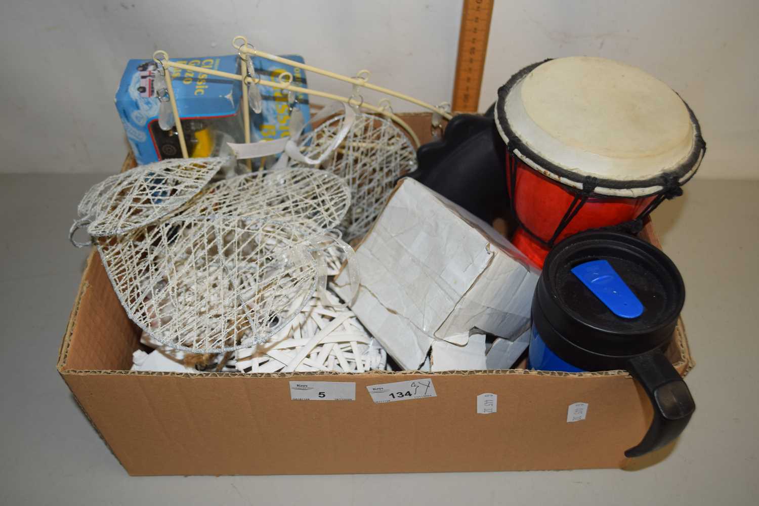 Box of hanging heart decorations, small drums etc