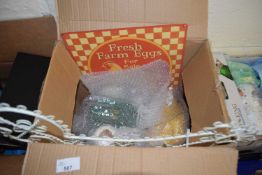 A collection of various chicken related items to include wirework chicken, Farm Fresh Eggs sign,