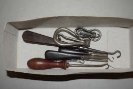 Small box containing a quantity of button hooks