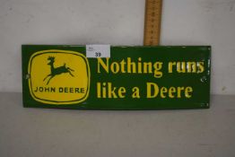 A metal advertising rectangular plaque for John Deere