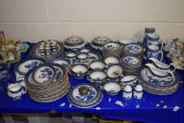 An extensive quantity of Booths Real Old Willow dinner ware comprising various tureens, serving