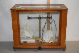 A wooden case containing some scales marked Gallenkamp