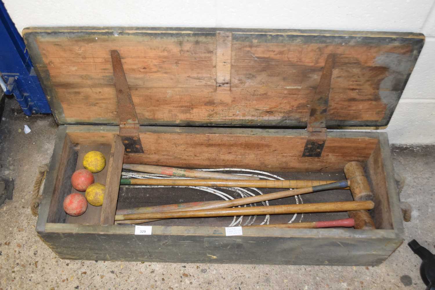 A vintage boxed croquet set