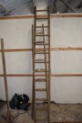 Two wooden step ladders