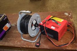 Battery trickle charger together with an extension lead