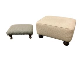 Two small upholstered footstools.