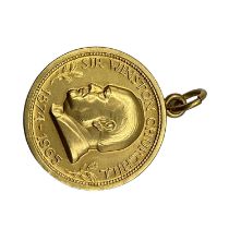 A 9ct gold Sir Winston Churchill commemorative coin pendant, 1874 - 1965 with 'We shall fight on the