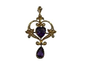 A 15ct gold amethyst and split pearl art nouveau style pendant. 2.01g. In original box without