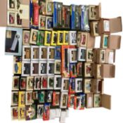 A large collection of boxed reproduction toy cars to include days gone vanguard etc.