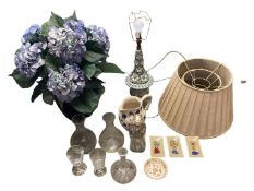 A quantity of decorative items to include lamp, faux Hydrangers, glassware etc