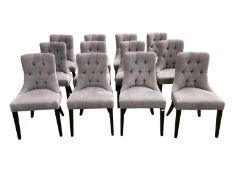 A set of good 12 bespoke made contemporary dining chairs, upholstered and button backed in a quality