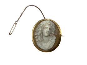 A 18ct gold mounted shell cameo. 5.09g.