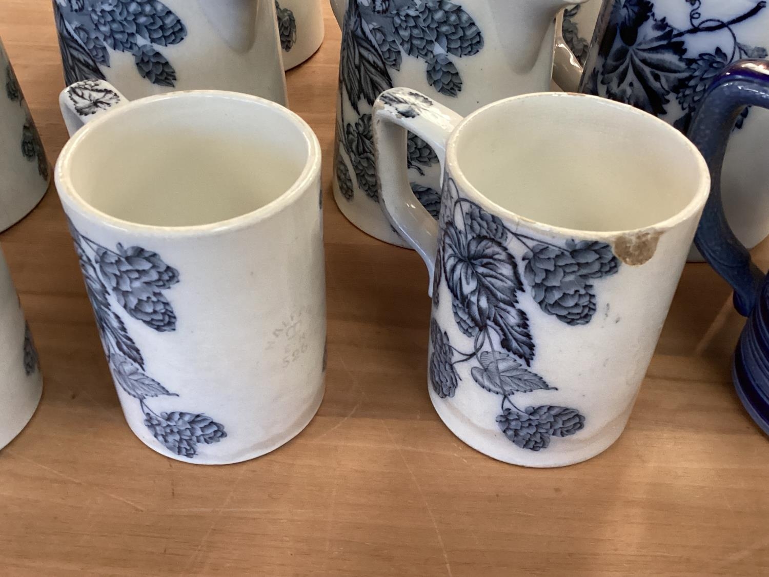 A set of Staffordshire blue and white graduated jugs together and other items. - Image 2 of 12