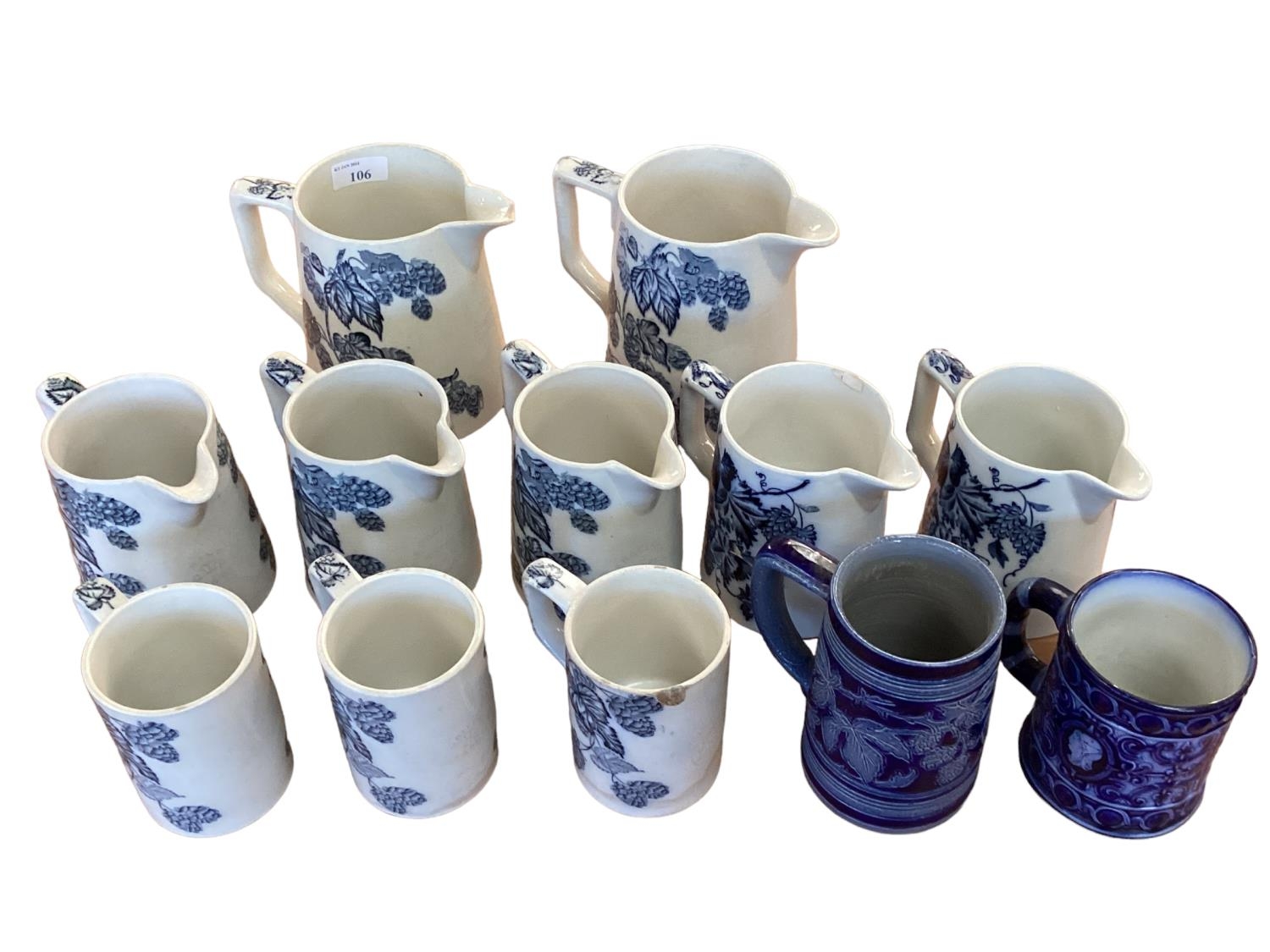 A set of Staffordshire blue and white graduated jugs together and other items.