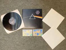 A 1973 SHVL 804 Pink Floyd, Dark Side of the Moon vinyl record Album. Both original accompanying