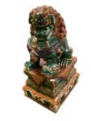 A large polychrome Ceramic Chinese style Dog of Fo on stand