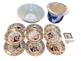 Quantity of china to include a blue and white plant pot and 9 Crown Derby plates, with some wear