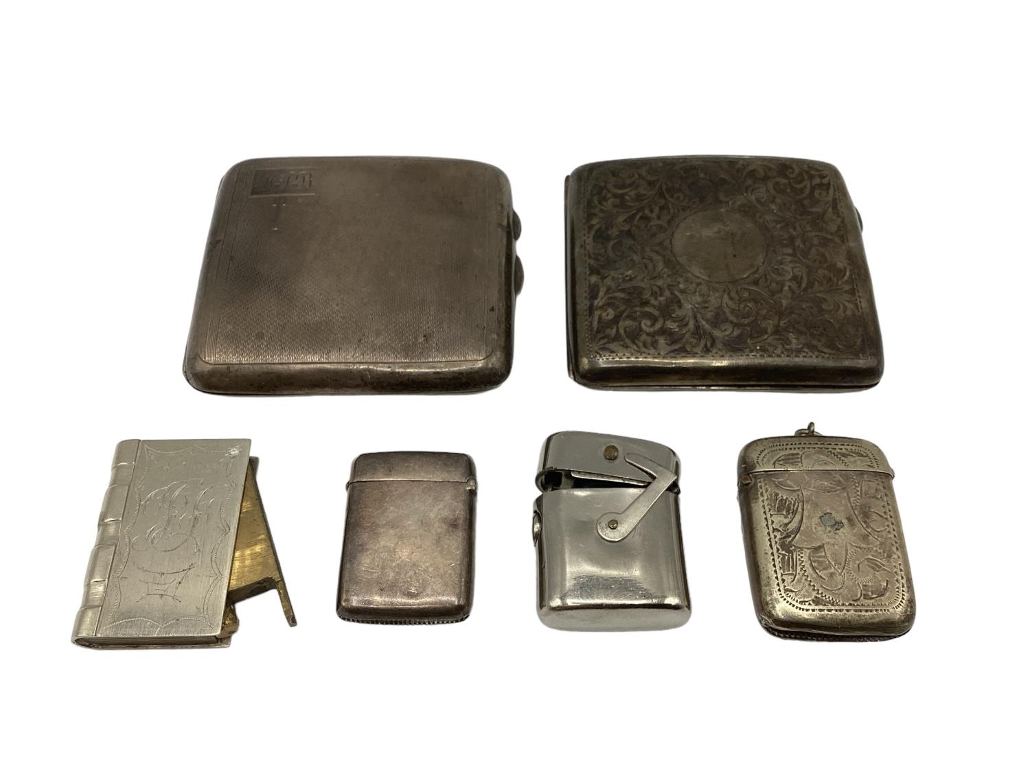 A collection of sterling silver vestas and cigarette cases together with two white metal examples. - Image 3 of 5