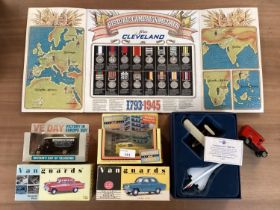 A collection of toy model cars and planes , vanguard etc. together with a Cleveland Historic